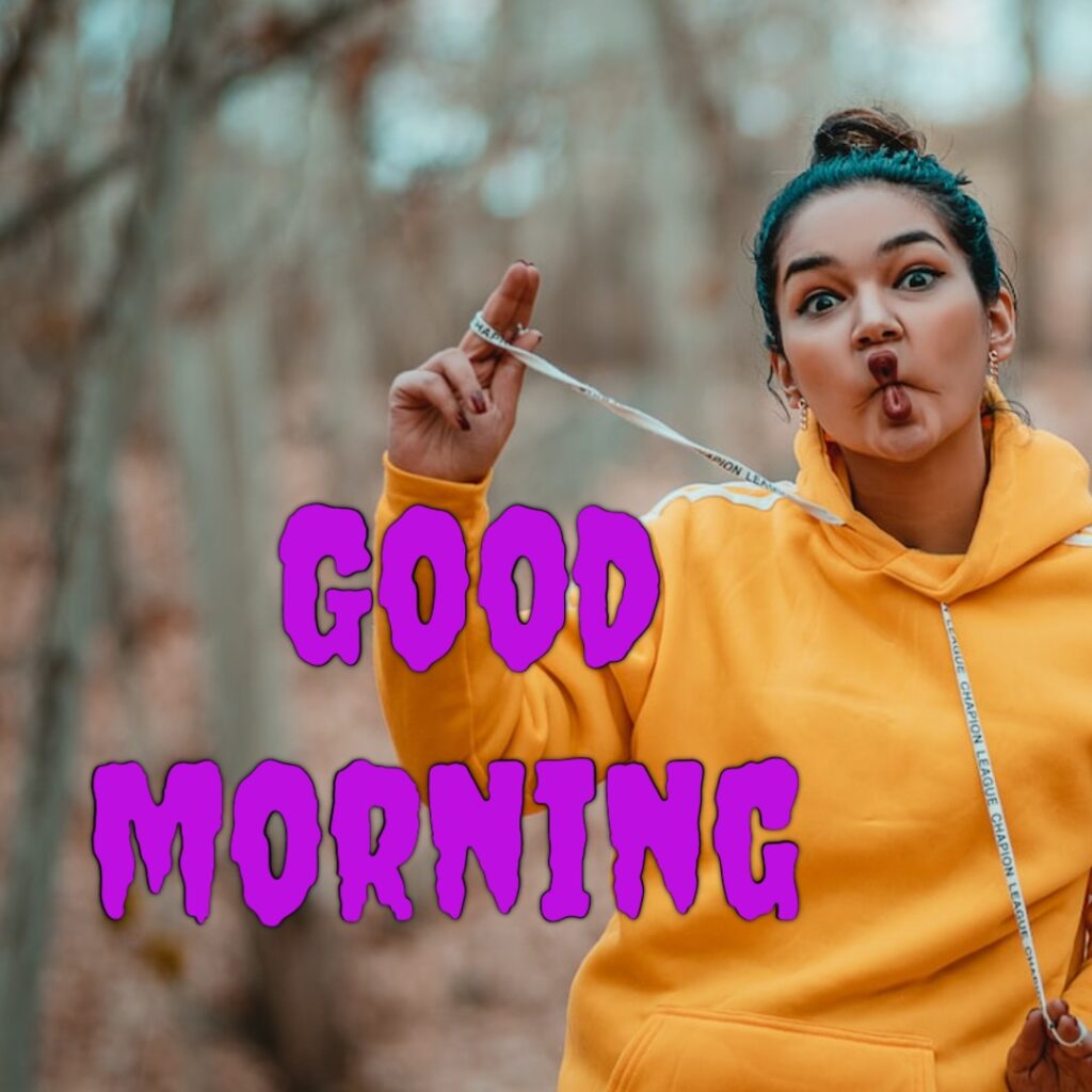 A funny girl having yellow sweeter looking like a funny good morning image
