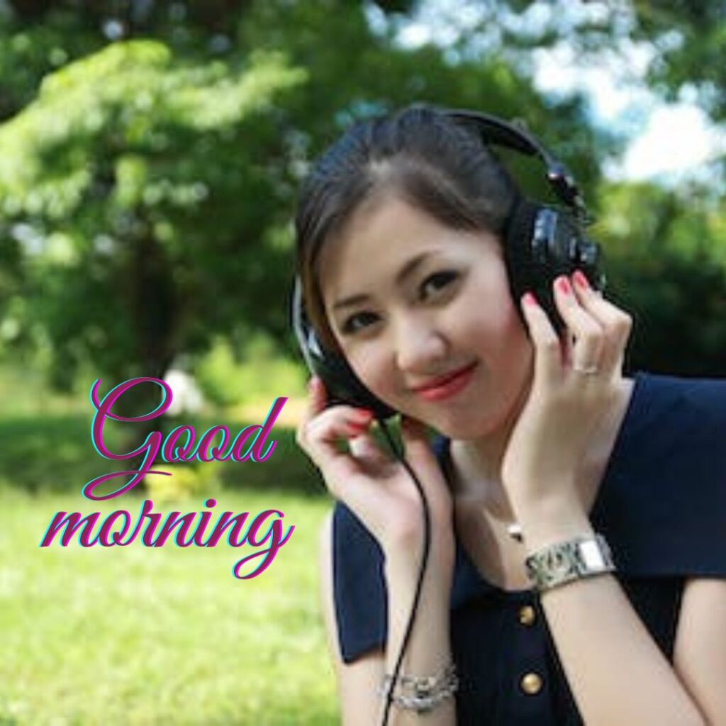 Hot girl good morning images in this a beautiful girl having a black colour t shirts and headphones