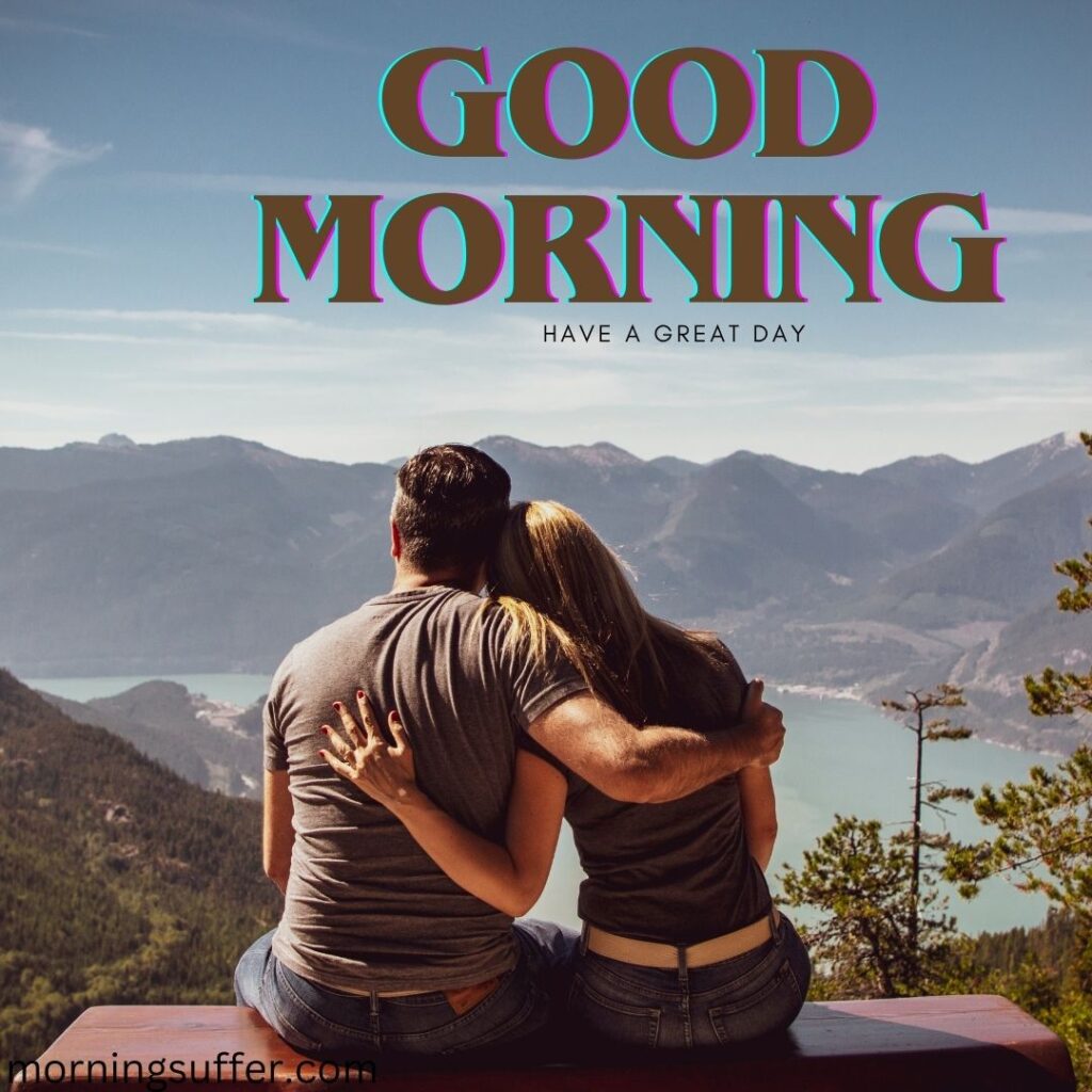 A beautiful couple sitting together on the top of mountain looking like a good morning images free download
